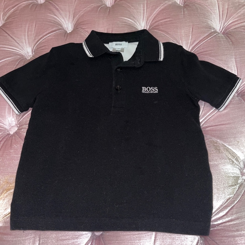 Hugo Boss boys polo t-shirt. Size 4. Black with white trim. Very Good condition